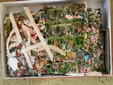 a box with a bunch of paper cutouts in it