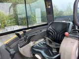 a view of the inside of a bus from the driver ' s seat