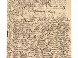 un bout de papier sur lequel est écrit quelque chose à la main