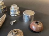 a lot of silver objects sitting on a table