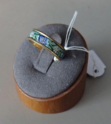a ring that is sitting on top of a ring box
