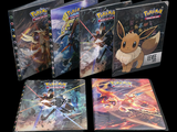 Plusieurs DVD des films Pokémon sont alignés sur une surface noire