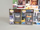 a lot of batman pop vinyl figures in the box