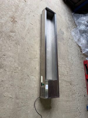 a picture of a wall mounted light fixture on a wall