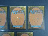 three decks of magic the gathering deck are shown on a table