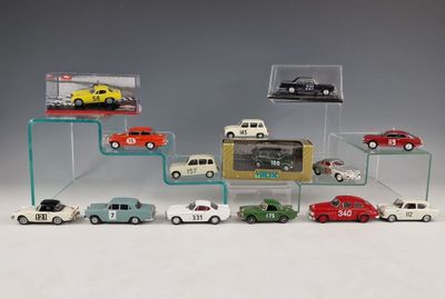 a lot of toy cars that are in a display case