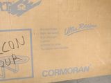 a cardboard box with a picture of a cat on it