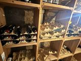 many bottles of wine on the shelves in the room