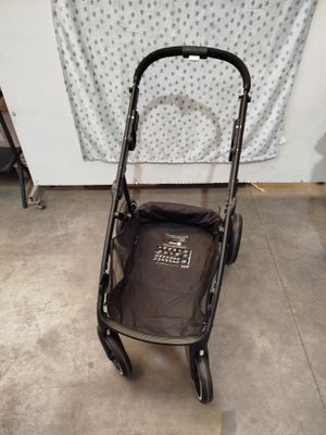 a baby stroller that is sitting on the floor