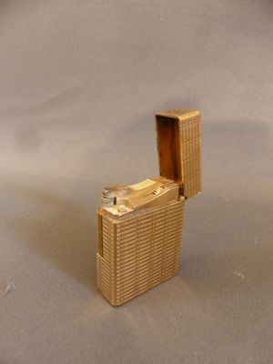 a small lighter that is sitting on a table