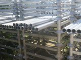 a lot of pipes that are stacked on top of each other