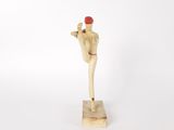 an image of a wooden figurine of a man holding a baseball bat