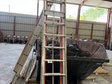 a ladder that is sitting in the middle of a building
