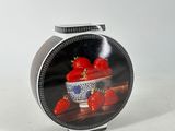 a picture of a bowl of strawberries on a table
