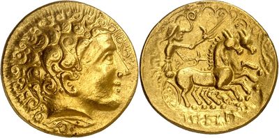 a gold coin with an image of a man on a horse