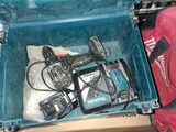 a blue tool box with tools in it and a person standing next to it
