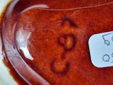 a close up of a bowl with a label on it