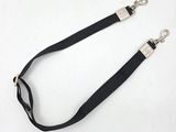 black dog leash with silver buckles on a white background