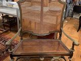 a chair that is sitting in the middle of a room