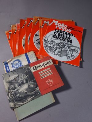a lot of books that are on a table