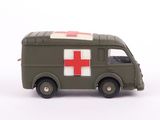 a green toy ambulance with a red cross on it