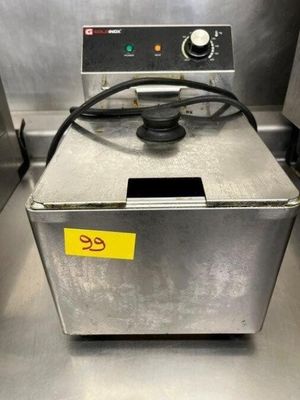 an image of a deep fryer in a commercial kitchen