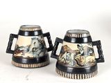 pair of black and white coffee mugs with horses on them