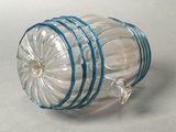 an image of a clear glass jar with blue stripes