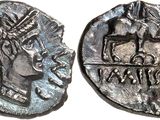 a silver coin with an image of a woman and a man on it