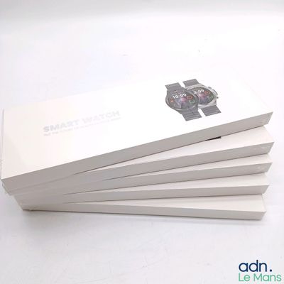 three white boxes with a watch on them are stacked on top of each other