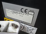 a close up of a piece of metal on a machine