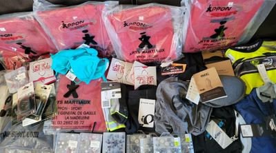 a lot of items that are sitting on a couch