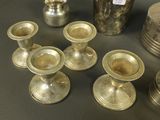 a lot of silver objects on the table