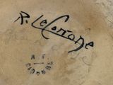 a close up of a plate with writing on it