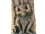 statue of a man and a woman riding on a horse