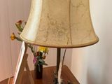 a lamp that is sitting on a wooden table