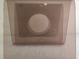 a glass plate with a circular design on it