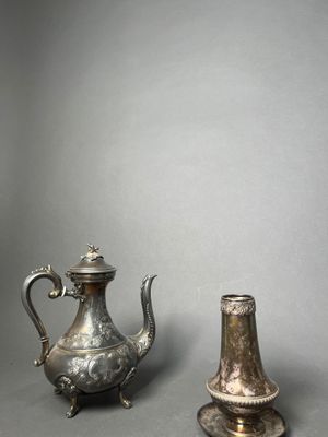 pair of silver plated teapots and a silver plated teapot