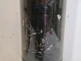a black blender with a red handle sitting on a counter