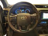 the interior of a car with a steering wheel and dashboard lights