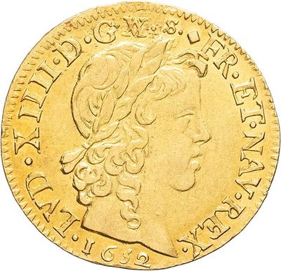 an image of a gold coin with a woman ' s head on it