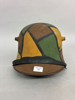 a close up of a helmet on a table with a tag on it