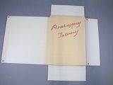 a piece of paper with writing on it hanging on a wall