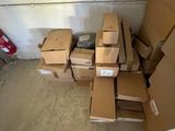 a pile of boxes sitting on the floor in a room