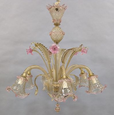 chandelier made of muranoni glass with pink flowers and gold accents