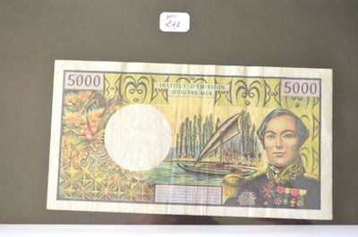 une photo d'un billet de banque sur lequel figure le portrait d'un homme