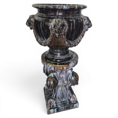 a vase that is sitting on a pedestal on a white background
