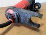 a small electric tool that is on a table