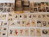 a table with a lot of cards and pictures on it