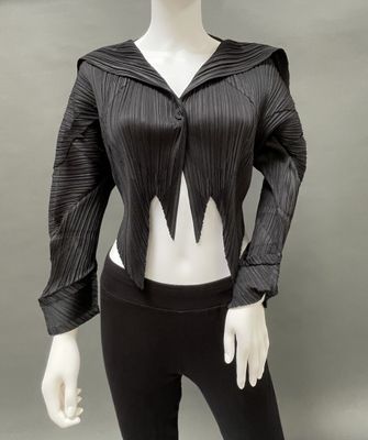 the mannequin is wearing a black top and black pants